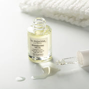 Lightweight eye oil texture showing fast absorbing botanical formula for smoothing fine lines and improving skin texture