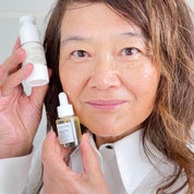 Founder demonstrating regenerating eye oil for mature skin showing real use for smoother brighter eye area