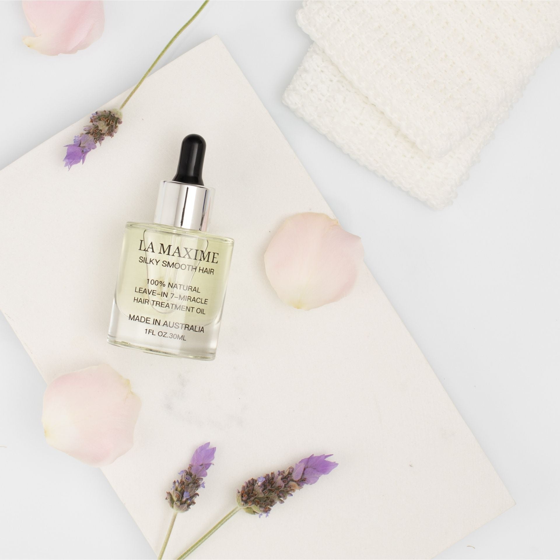 natural hair oil with botanical ingredients for hydration repair and shine