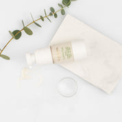 Organic eye cream with natural botanical ingredients styled on minimal background for sensitive and mature skin care